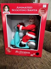 Mr. Christmas Animated Scooting Santa Lights Music Plays 24 Songs Santa Scooter picture