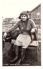 RPPC Postcard Aleutian Girl Unalaska Hat Boots Sitting on Bench picture