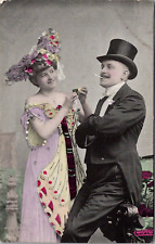 Postcard Colorized novelty couple smiling man smokes woman strikes match Mead WA picture