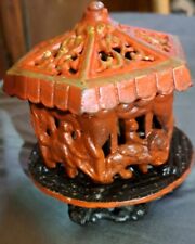 Antique Cast Iron Hand Painted Spinning Carousel Coin Bank picture