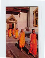Postcard The priests out from temple hall after daily sutra Bangkok Thailand picture