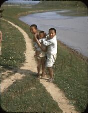 Korea Boys River Slide 1950s picture